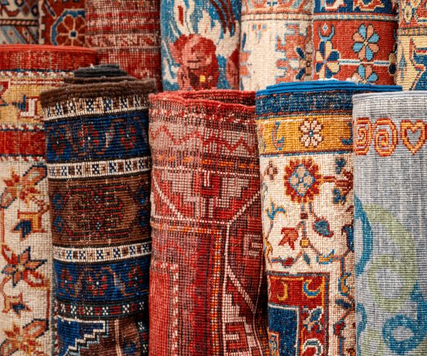View of multiple carpets for sale at the Grand Bazaar in Istanbul, Turkey